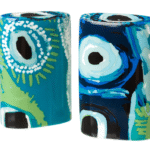 Bring some bright, Australian fun spice to your table with this pair of stunning salt and pepper shakers made with fine bone china, featuring the artwork 'Detail from 'Untitled', by May Mayiwalku (May Wokka) Chapman, courtesy of Martumili Artists.